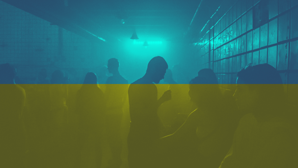 Nightclubbers under a Ukrainian flag